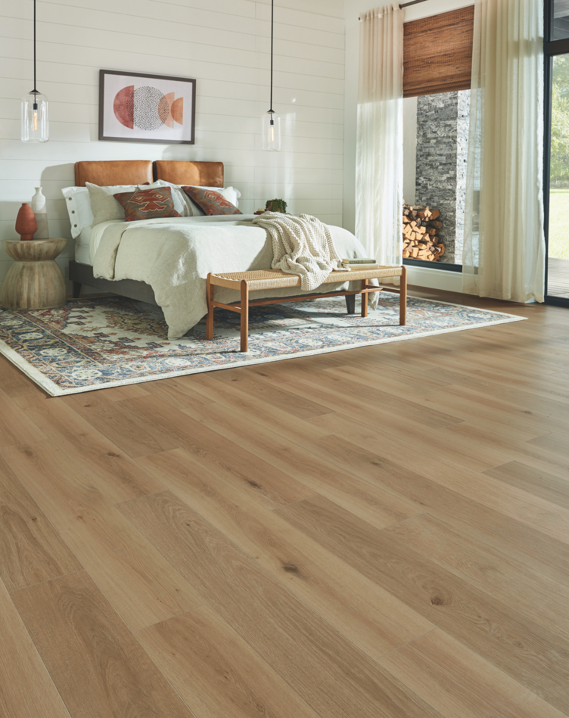 area rug in a bedroom over laminate floors